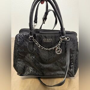 GUESS Black Logo-Embossed Satchel with Silver Chain Charm